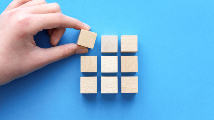 a square consisting of 3x3 wooden dice